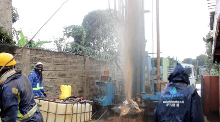 Community members celebrating the water project completion