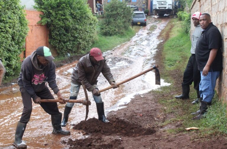 Local volunteers helping with the water project installation
