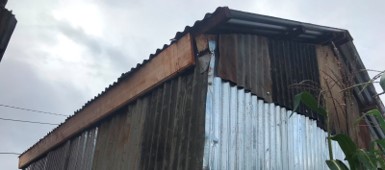 The completed walls and roof of Veronica's new house.