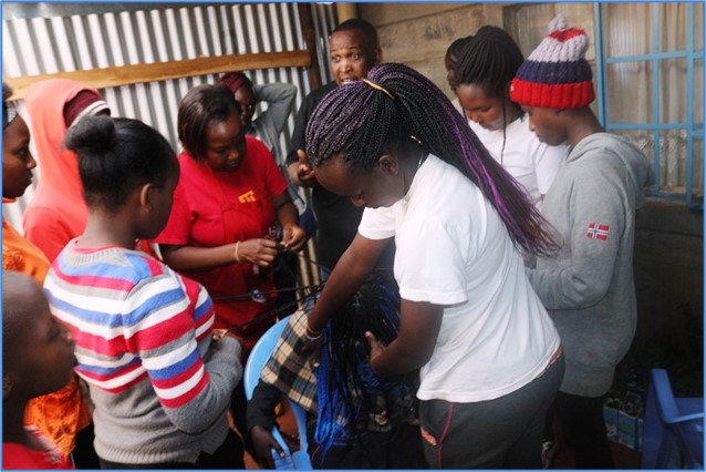 Handing out essentials to families in the programme.