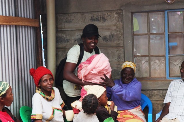 A young mother and her baby supported by James CBO.