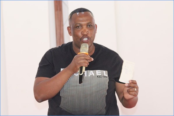 A speaker opens the Youth Forum.