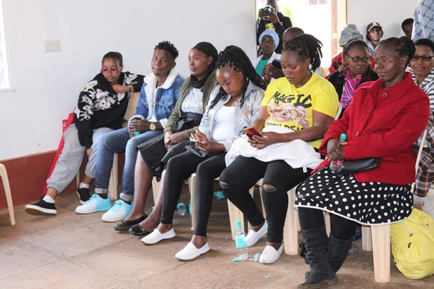Teenagers fill the hall for the forum.