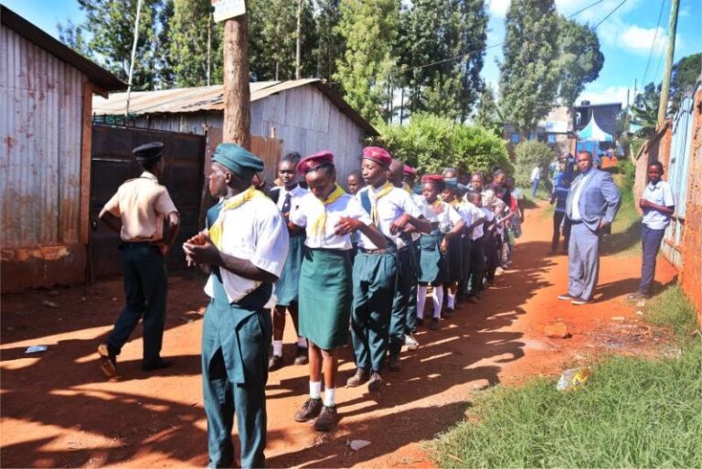 Schoolchildren in uniform on their way to class.