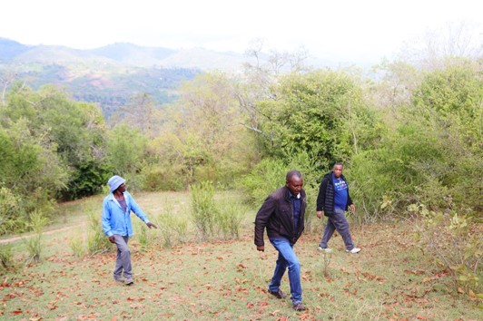 Walking the land set aside for the rehabilitation centre.